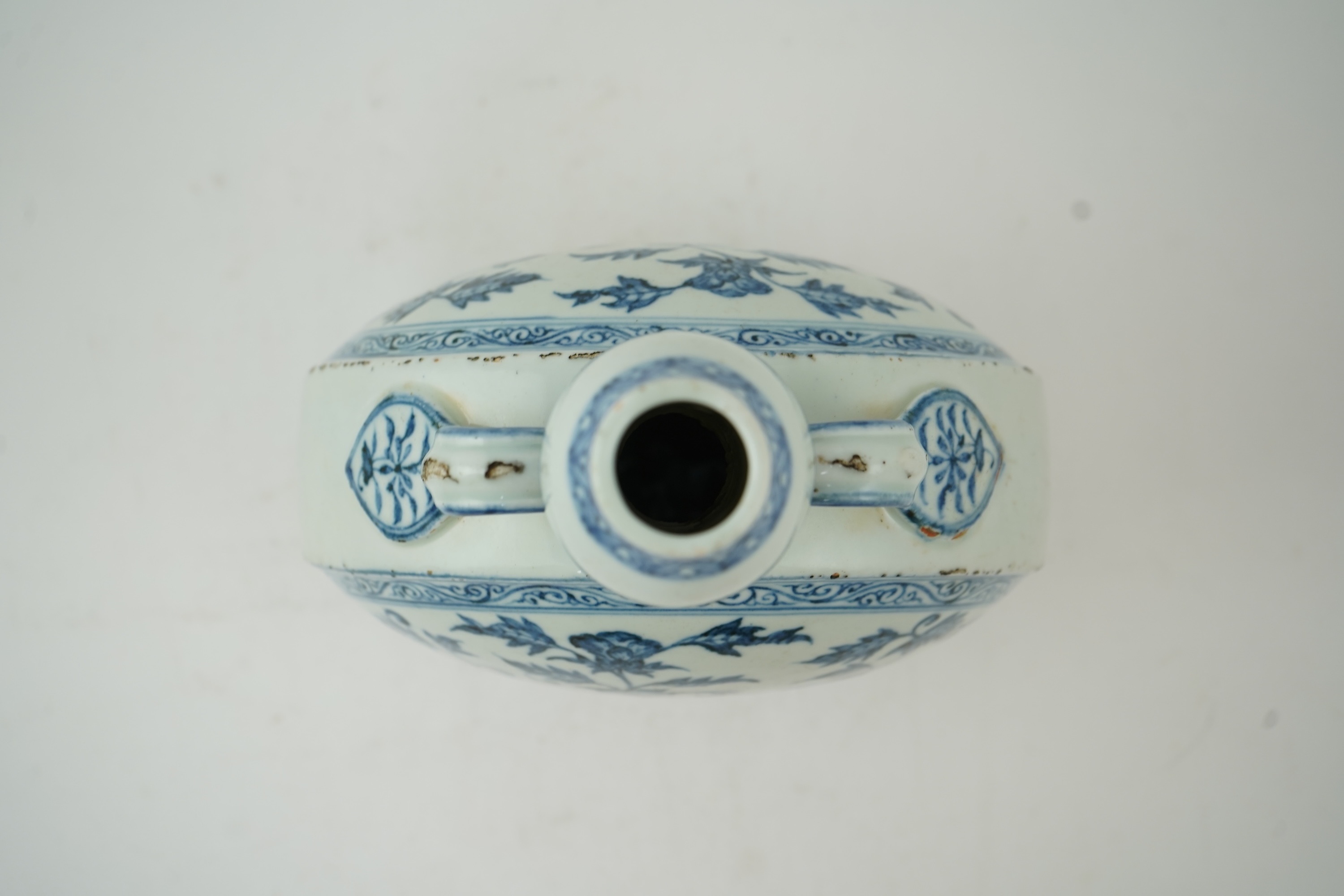 A Chinese blue and white moon flask, bianhu, in Ming style